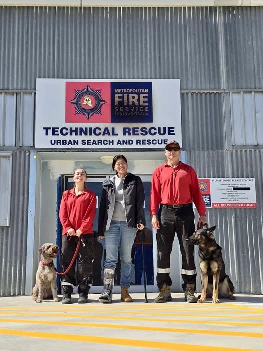 Natt Hamon of K9 USAR Thailand with her search-and-rescue dog Simba, featured by Search and Rescue Canines South Australia for International Dog Day